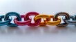 © SashaMagic - A colorful metallic chain linked together in vibrant hues.