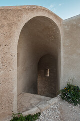 Wall Mural - A passage leading down some steps in the fortified wall at Bonifacio in Corsica