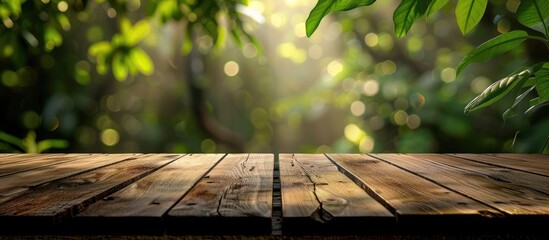 Aufkleber - Wooden table with no items, background of blurred green plants, ideal for product displays, with copy space image.