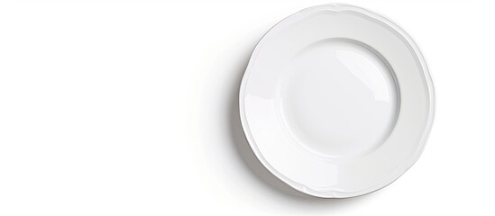 Poster - An isolated white plate seen from above on a white background with a clipping path included for adding a copy space image.