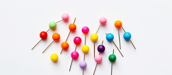 Poster - Colorful pin on a white background with copy space image.
