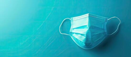 Poster - Isolated medical surgical face mask with a filter on a background with copy space image.