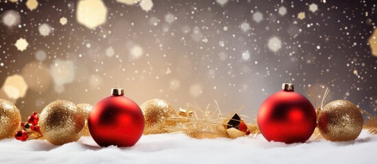 Poster - Red Christmas ball and golden bell baubles on snow, providing a festive display with copy space image.