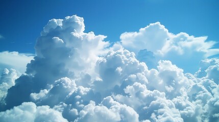 Poster - Watching fluffy white clouds drift lazily across a bright blue sky on a sunny day brings a sense of peace and relaxation.