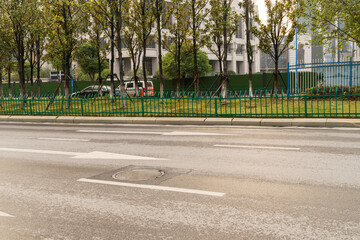 Wall Mural - Empty urban road and buildings in the city