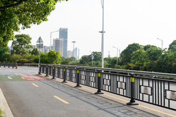 Wall Mural - Empty urban road and buildings in the city