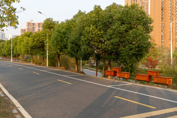 Wall Mural - Empty urban road and buildings in the city