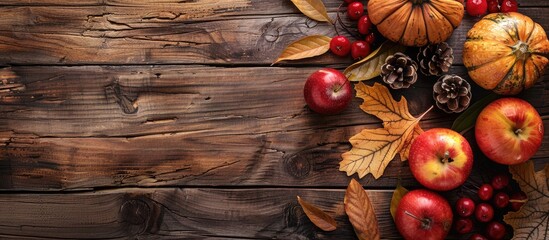 Poster - Top view of an autumn-themed still life on a wooden background with copy space for text.