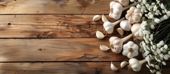 Poster - Wooden background featuring fresh garlic, with copy space image available.