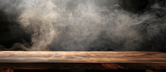 Leinwandbilder - Copy space image: Wood table on black backdrop with smoke rising, perfect for showcasing products.