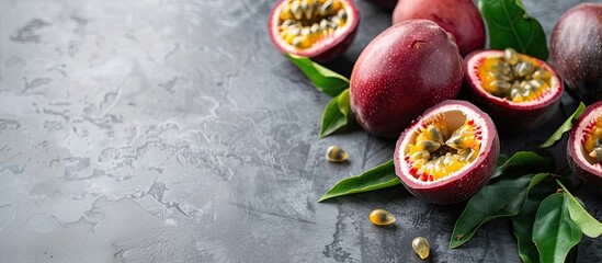 Poster - Fresh passion fruit with copy space image on a gray table.