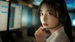 © Robert Anto - A focused female call center agent wearing a headset, working in a modern office environment, exemplifying professionalism and dedication.