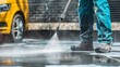 © PaulShlykov - Wet cleaning of street with pressurized water.