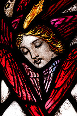 The American church in Paris. Stained glass window.  Angel. .