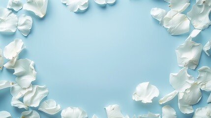 Wall Mural - Border of white petals on a light blue background, creating space for mockup designs with an empty center