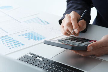 Poster - Business financial analysis. Businessman calculating budget. Many reports and calculator.