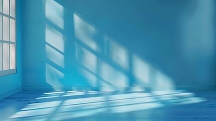 Wall Mural - Sunlight casting shadows on a serene blue room interior