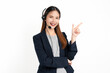 © sitthiphong - Cheerful beautiful Asian woman consultant wearing microphone headset of customer support phone operator at workplace on white background.