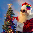 © elenarostunova - Portrait of funny Santa Claus man next to Crhistmas tree  in sunglasses  against the blue background.  Square frame