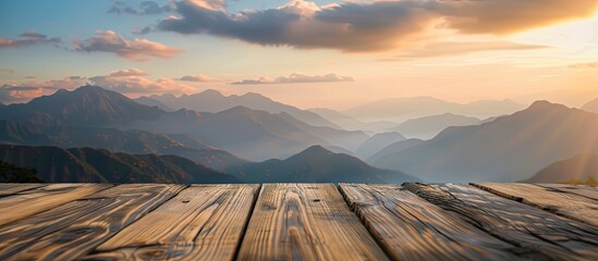 Canvas Print - Background of blurred sky and mountains enhances beauty of wooden table in the image with a copy space image.