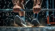 © Surachetsh - A close-up of a person's hands gripping a barbell, ready for a lift. The image highlights the strength and preparation involved in weightlifting, with chalk particles