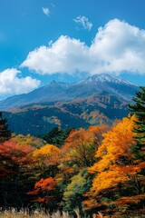 Colorful autumn leaves and Mount Asma in the distance