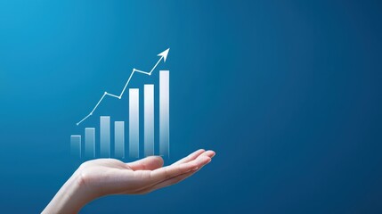 A hand holding virtual graph displaying business growth on blue background symbolizing success and financial progress