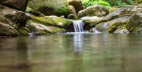 Sticker - Waterfall on the river in nature in summer