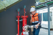 © Washburn - Engineer under checking the industry Fire Protection system