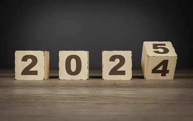 Countdown made of wooden cubes with text 2024-2025. New Year concept. Calendar sign, event, celebration illustration. Blurred background, 3D rendering.