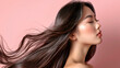 © Everlyn Stock Model - Beautiful Asian Woman with Flowing Shiny Hair on Pink Background
