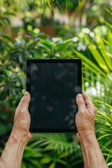 Poster - A person holding a tablet in their hands