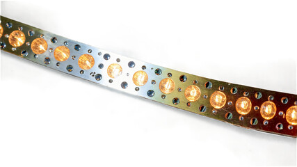 Aufkleber - A long thin strip with a reflective surface typically made of plastic or metal and used to adorn Christmas trees or other objects.