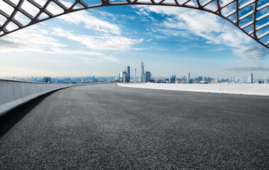 Wall Mural - Empty asphalt road and cityscape in modern city