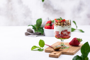 Wall Mural - Dessert with strawberry, yogurt and granola