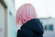 © Lidok_L - Woman with Pink Hair in Black Hoodie Walking Outdoors