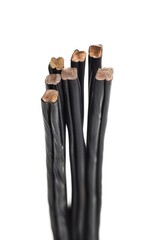 Poster - A close-up shot of a cluster of black electrical wires