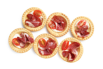 Wall Mural - Delicious canapes with jamon, cream cheese and cherry tomatoes isolated on white, top view