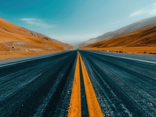 Canvas Print - A long and winding road stretches out into the distance, flanked by mountains. AI.