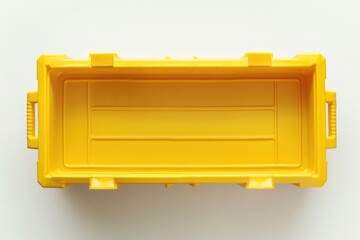 Poster - A small yellow plastic box sits on a clean white surface