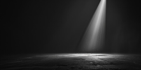 Sticker - A black and white photo of a beam of light with a mysterious atmosphere