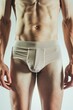 © Fotograf - Close-up of a man wearing brief underwear