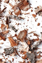 Poster - A pile of wood shavings on a white surface, great for backgrounds or DIY projects