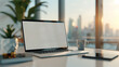© Iana - A mockup of an open laptop with a blank screen placed on an office desk, with a city skyline background through a large window