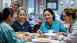 © D-point - Healthcare Workers Sharing a Meal in the Hospital Break Room, Emphasizing Team Bonding and Diverse Workforce Engagement