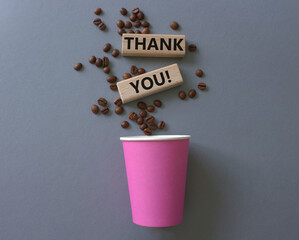 Wall Mural - Thank you symbol. Wooden blocks with words Thank you. Beautiful grey background with coffee cup. Business and Thank you concept. Copy space.