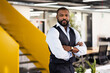 © VICTOR TORRES/Stocksy - Confident businessman standing in modern office