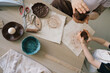 © Vradiy Art/Stocksy - In pottery workshop