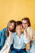 © Melissa Milis Photography/Stocksy - Happy mom and kids portrait