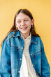 © Melissa Milis Photography/Stocksy - Kid wearing Oversized jean jacket